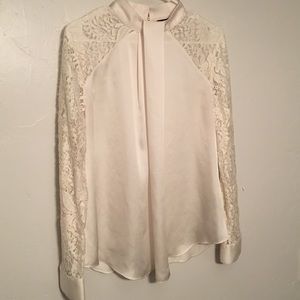 Off-white blouse with lace sleeves
